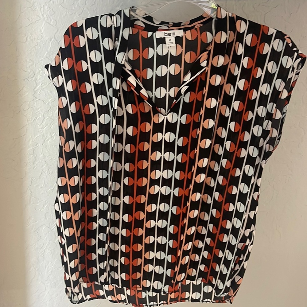 Orange black top